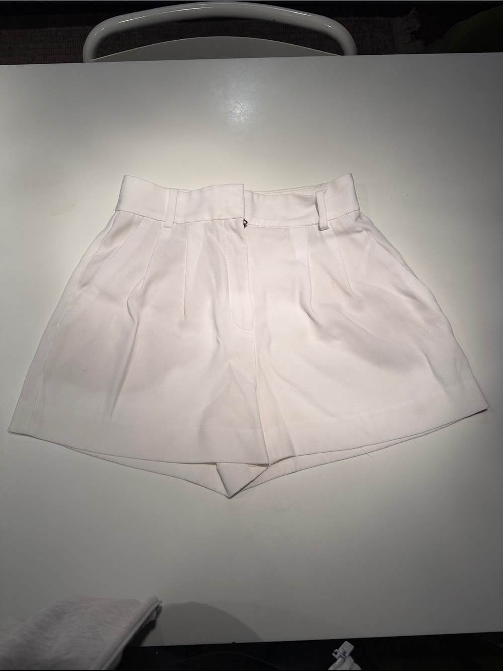 Babaton White High-Waist Pleated Shorts